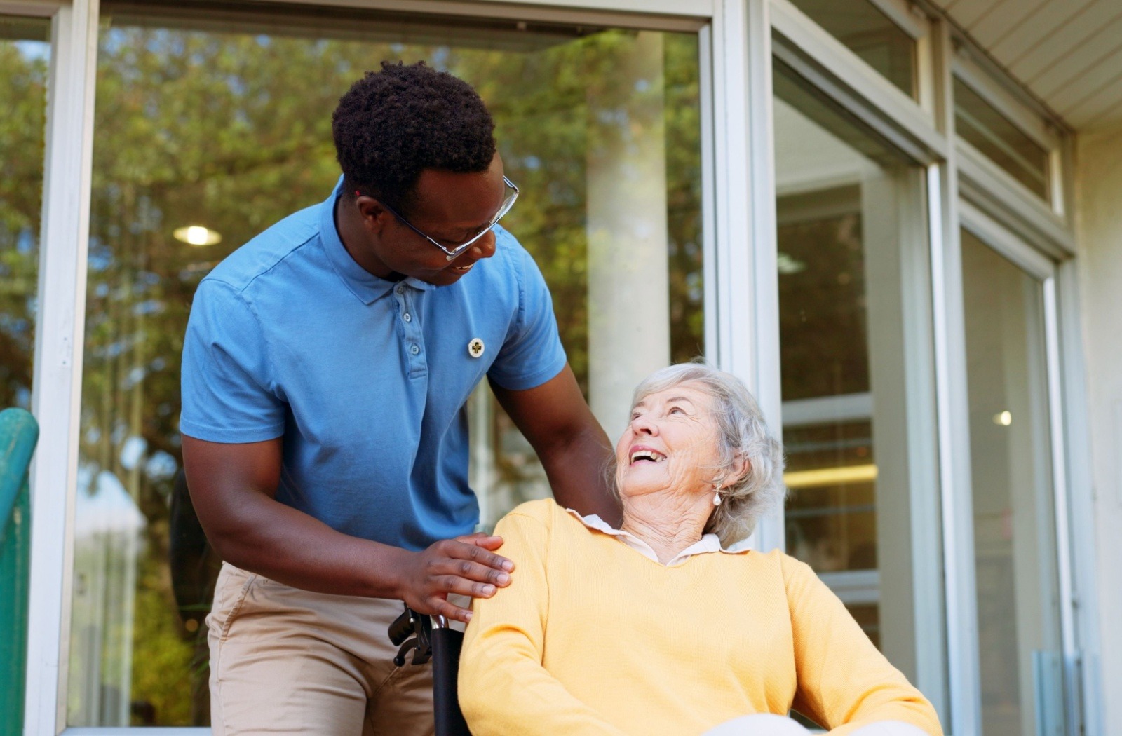 a carer greets a senior